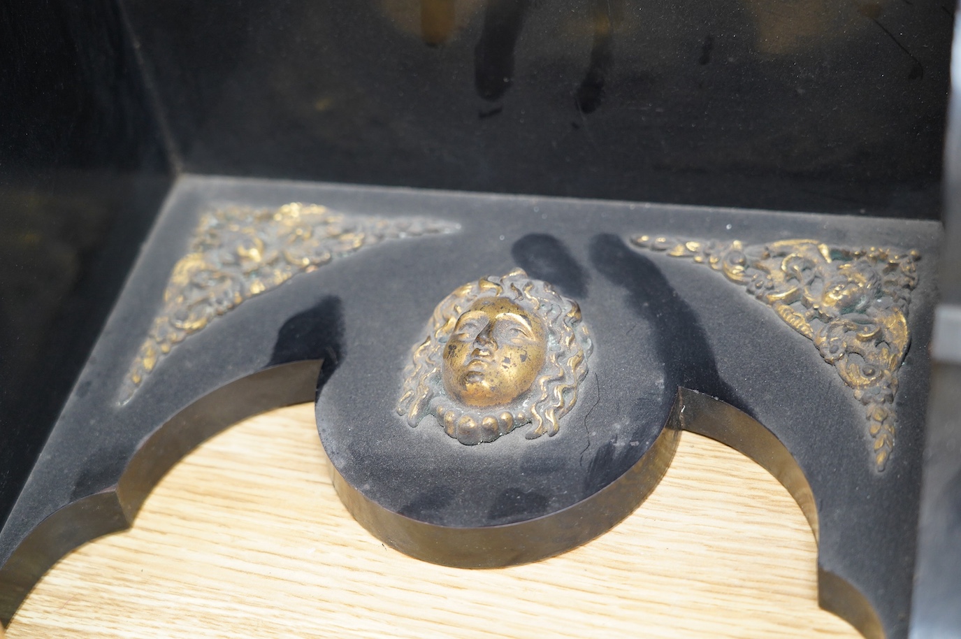 A large Edwardian ebonised mahogany and ormolu mounted bracket clock and bracket, movement by W&H Sch., striking on two coiled gongs, dial signed J. Lewis, Margate and Ramsgate, 71cm high. Condition fair to good, the clo